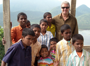 Director Geoff Hales with orphans